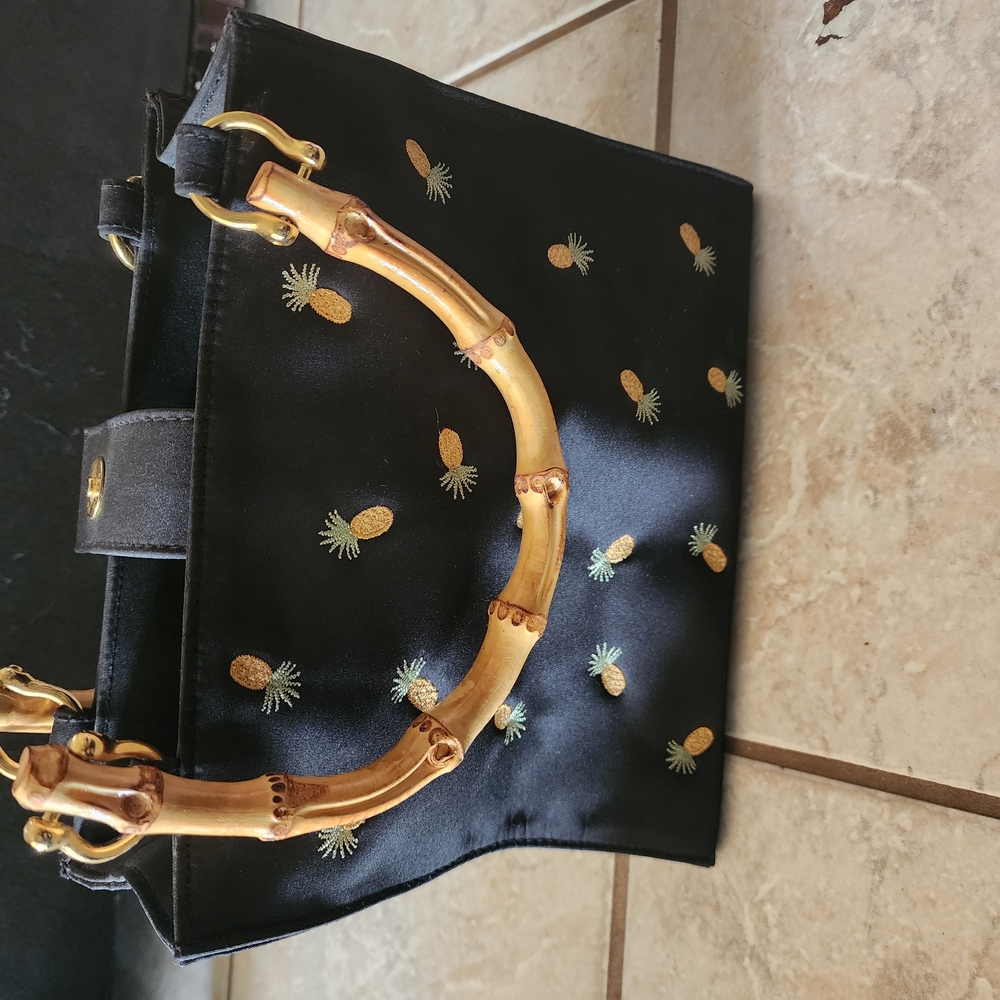 Black and Gold Mini Bag with Elegant Design